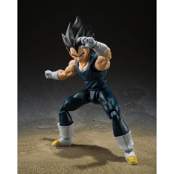 Vegeta from the "Dragon Ball Super: Super Hero" movie, released in 2022, has been sculpted using the latest articulation technology Bandai has to offer! The paintwork has been implemented in a way that will remind the user of the vivid colors used in the actual movie. He comes with three replaceable facial expressions: a grinning face, a shouting face and a clenching face - along with replaceable wrist parts.  Stands approximately 5.3" (13.5cm) tall.