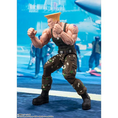 Guile from the "Street Fighter" game series finally joins the "S.H.Figuarts" action-figure lineup from Bandai! He wears his classic costume, seen in the early part of the series, as well as the latest game, "Street Fighter 6"! His wide range of motion allows you to reproduce his special moves, and he comes with a Sonic Boom effect part, too. A background sheet with a stage from the game is included, as are two interchangeable faces.