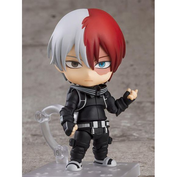 From the anime movie My Hero Academia The Movie: World Heroes' Mission comes a Nendoroid of Shoto Todoroki in his costume original to the movie! His stealth suit has been faithfully recreated in Nendoroid form. He comes with 3 face plates including: a standard expression, a combat expression, and a perplexed expression. Fire and ice parts for recreating his Half-Cold Half-Hot Quirk are included, allowing you to create all kinds of action-packed poses.