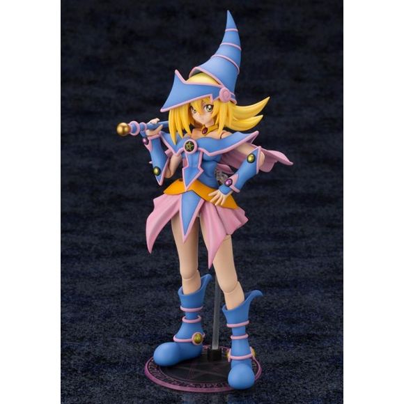 Kotobukiya is excited to present the Yu-Gi-Oh! Cross Frame Girl Dark Magician Girl Model Kit! This model kits comes with several accessories and interchangeable parts including 4 face parts, 5 pairs of wrists, 2 hats, 2 bang parts, a rod weapon, and a magic spellbook.