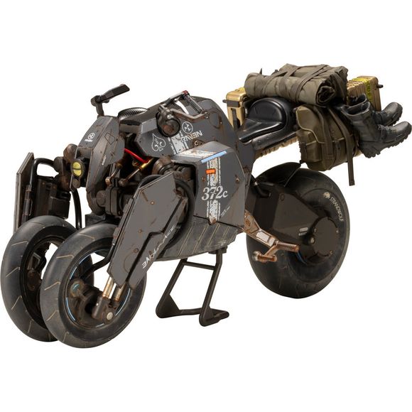 Kotobukiya brings us a 1/12-scale model kit of the Reverse Trike from the opening of the game "Death Stranding," as driven by the main character Sam Porter Bridges! The headlights and rear luggage are newly molded, and the coloring and markings are also new. It can be built in one of two modes: on-road and off-road. Two types of stands are included, one for each of the modes.