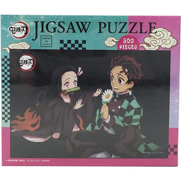 Puzzle features Tanjiro and a shrunken down Nezuko. Measures approx. 10.23" x 14.96" (26cm x 38cm) when completed