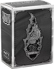 To celebrate Dragon Shield's 25th anniversary, we have released a special edition Matte Art sleeve cast in black and decorated with our silver anniversary shield artwork.
These special edition Matte sleeves offer a stunning contrast of black and shining silver, while never compromsing on the high-quality, durability and aesthetics of Dragon Shield sleeves. The Matte sleeves have a textured back that makes shuffling a dream, and the entire sleeve box is decorated with silver for a wow-effect.
Dragon Shield S