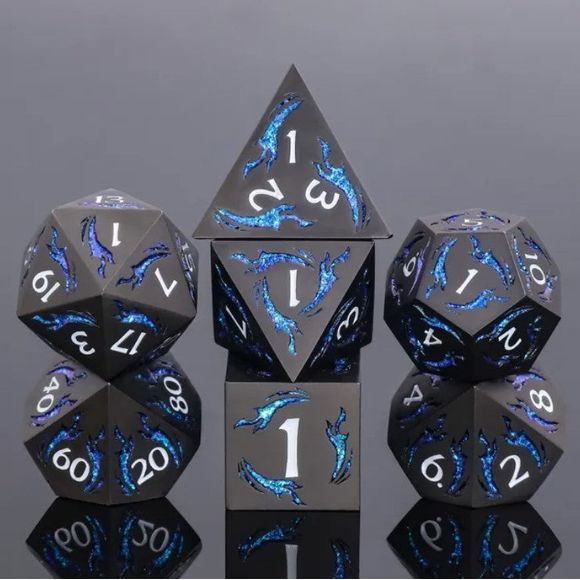 The perfect companion for your gaming needs! These premium die-cast polyhedral dice are exactly what you've been searching for that upcoming game night with the group. Each set weighs roughly 5 ounces and are stored in a quality, brushed metal tin with foam insert. These dice are engraved with crisp, easy-to-read numerals. Many styles and colors are available.

This set includes one of each: d20, d12, d10, d10 (percentile), d8, d6, and a d4 (7 dice in total). All inside a premium Dice Tin.