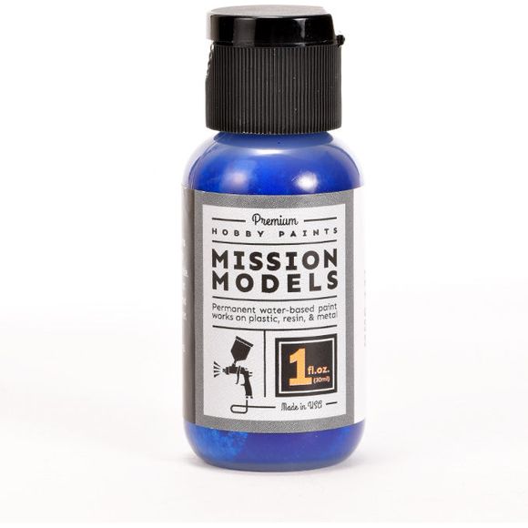 Water based acrylic.  Use 20%-30% MMP thinner to 1 part paint. (2-3 drops thinner to 10 drops of paint thinner). Mission Models paint thinner is very powerful and only the smallest amount of thinner is needed. In the mixing cup your reduced paint will appear thicker than what you may be used to: this is normal. MMP paint will dry smooth, thin and level. It will not hide the finest of details. Mixed properly you will find a beautiful opaque finish which requires minimal coats.

TIP: add one or two drops of M